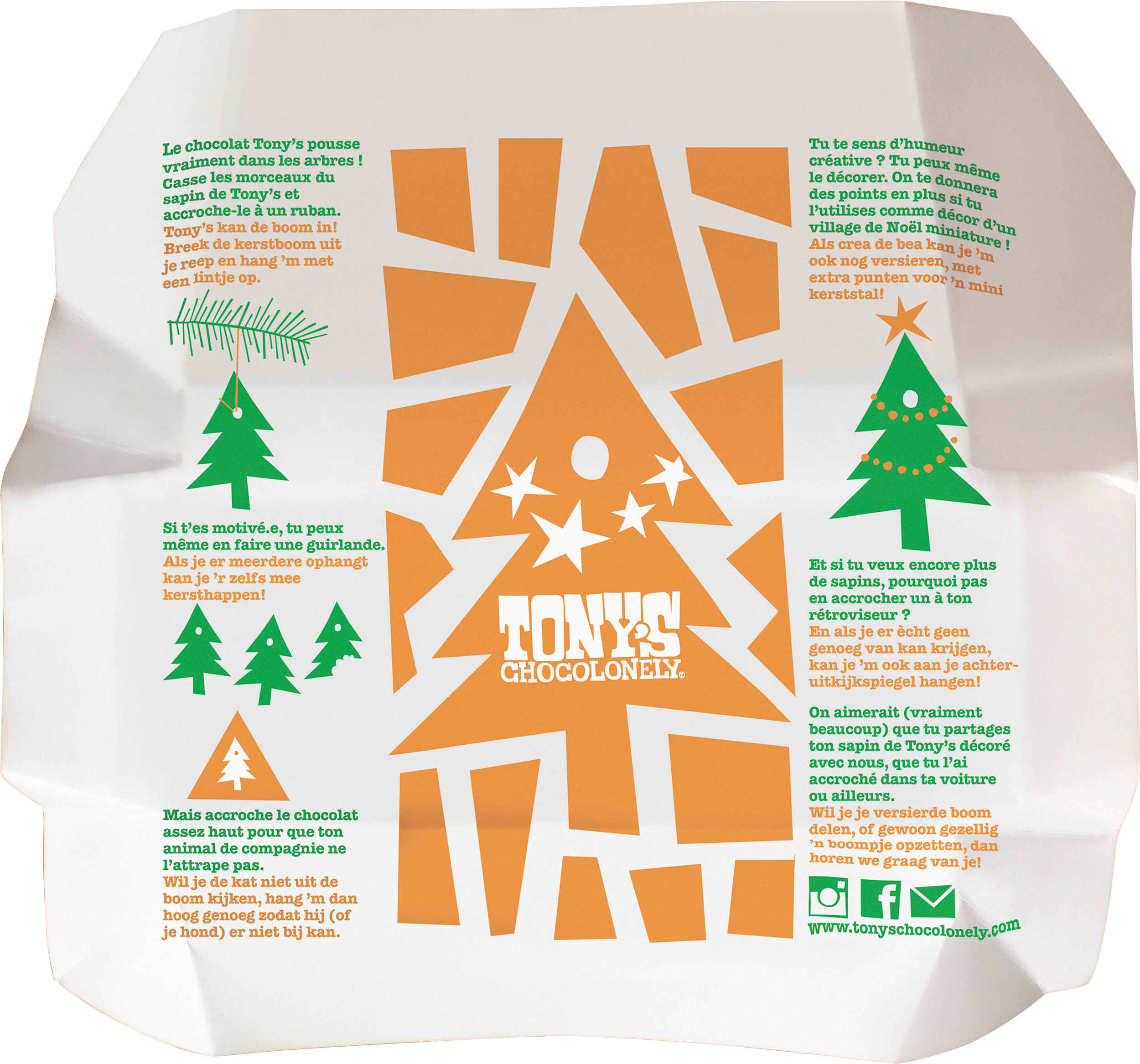 Binnenkant van de wikkel van Tony’s Chocolonely melk gingerbread reep met feestelijk ontwerp, productverhaal en groene kerstboomprint.